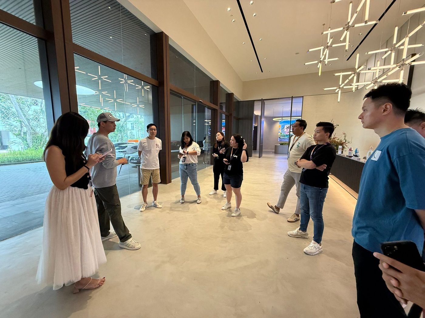 Team briefing in modern development lobby